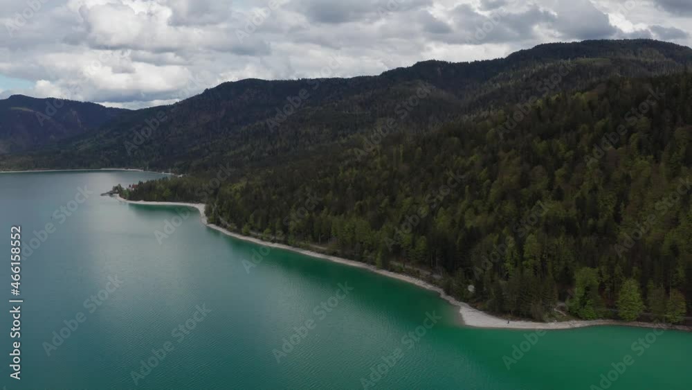 Lake Walchensee in Bavarian Alps from above with white clouds in sky, Bavaria
