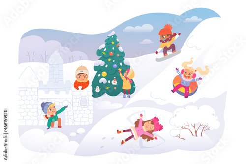 Kids play  enjoy winter and xmas holiday  cute children building castle from snow balls