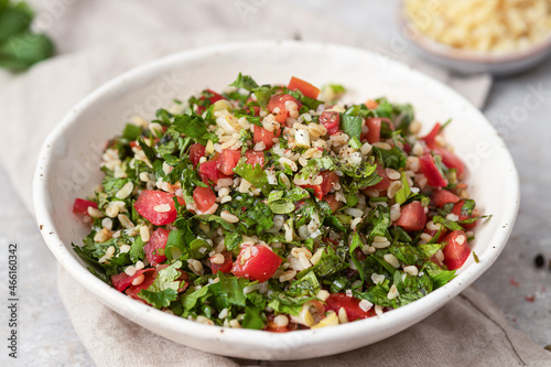 Fresh  tabbouleh salad with  parsley, mint, bulgur, tomato. Traditional middle eastern or arab dish