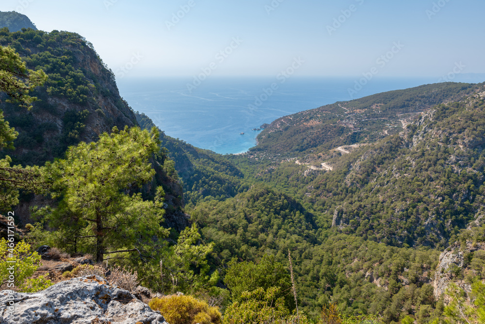 Turkey sea and mountain landscape photo, mediterranean Turkish coast area near Fethiye, taken on Lycian way hiking route. Nature, outdoor, hiking and trekking concept image	