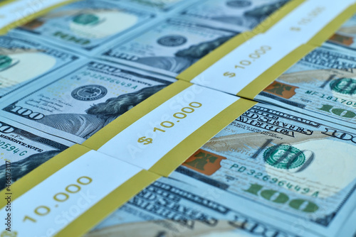Close up of bundles of one hundred dollar bills.