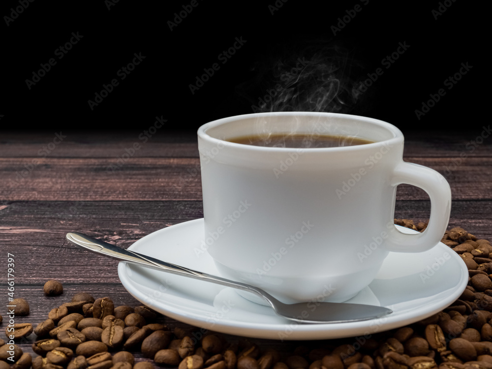 Fototapeta premium cup of coffee with beans