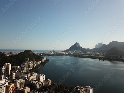 Rodrigo de Freitas Lagoon in Rio de Janeiro, BR. Panoramic view done via drone showing lagoon, sean and moutains © Rodrigo
