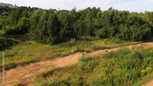 Motocross track, aerial shot. Sandy road with motorcycles photo