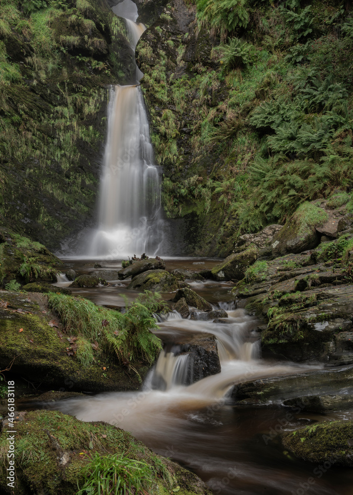 Fototapeta premium Stunning long exposure landscape early Autumn image of Pistyll Rhaeader waterfall in Wales, the tallest waterfall in UK