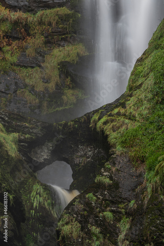 Stunning long exposure landscape early Autumn image of Pistyll Rhaeader waterfall in Wales, the tallest waterfall in UK
