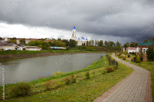 the embankment of the city with a church