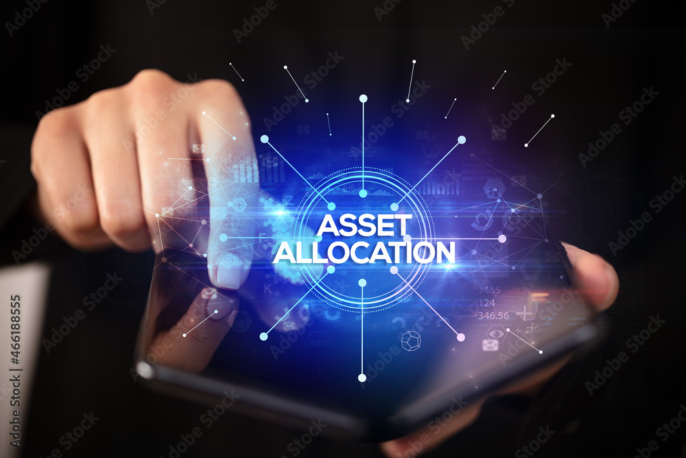 Businessman holding a foldable smartphone, new business concept Businessman holding a foldable smartphone, new business concept