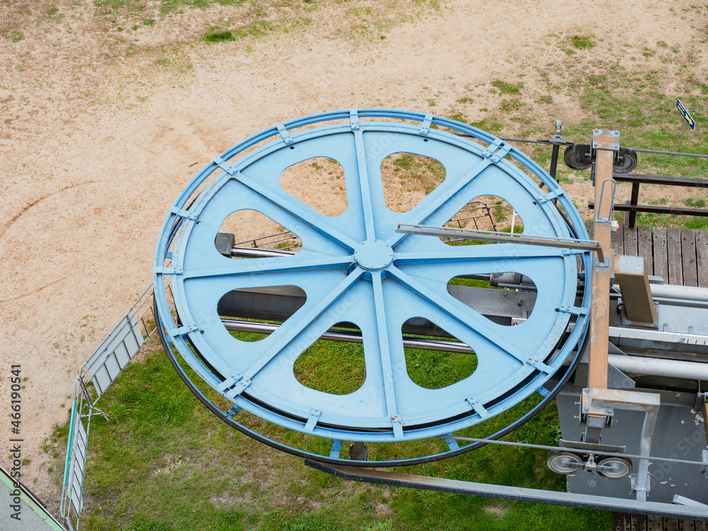 Details of the ski lift engine wheel. Elements of the steel wheel,