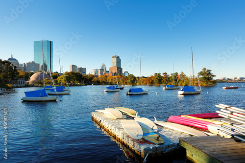 Boston Skyline at Autumn showing Charles River Esplanade at early morning with fall foliage. The Charles River Esplanade of Boston, MA, is a state-owned park in the Back Bay area of the city. photo