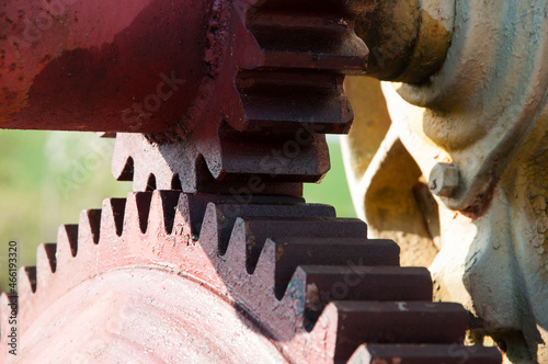 two iron gears. connection concept. parts of the rotating mechanism photo