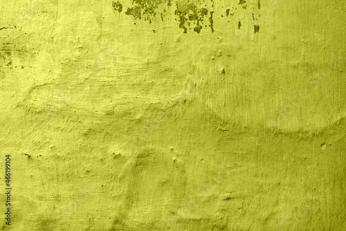 Texture of a concrete wall with cracks and scratches which can be used as a background photo