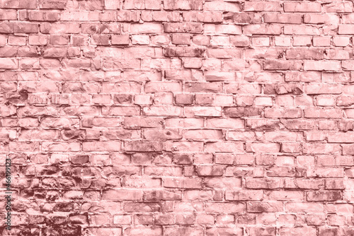 Texture of a brick wall with cracks and scratches which can be used as a background