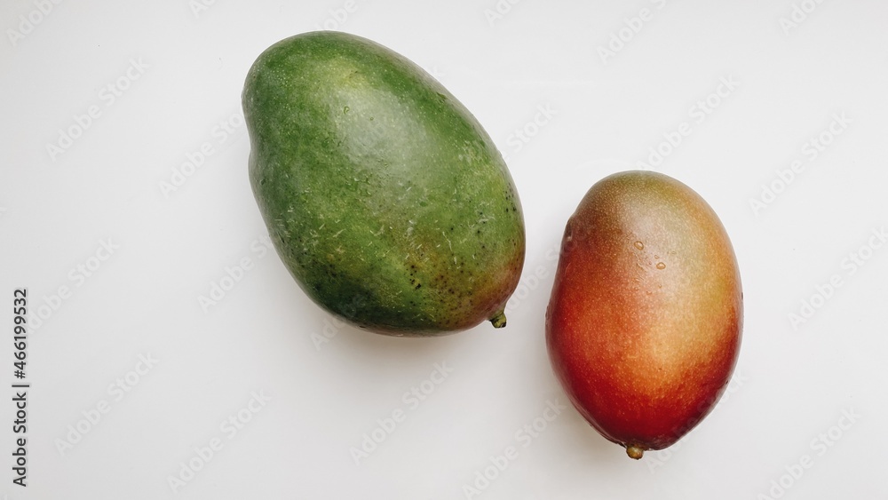 red and green ripe mango on white background red and green ripe mango on white background