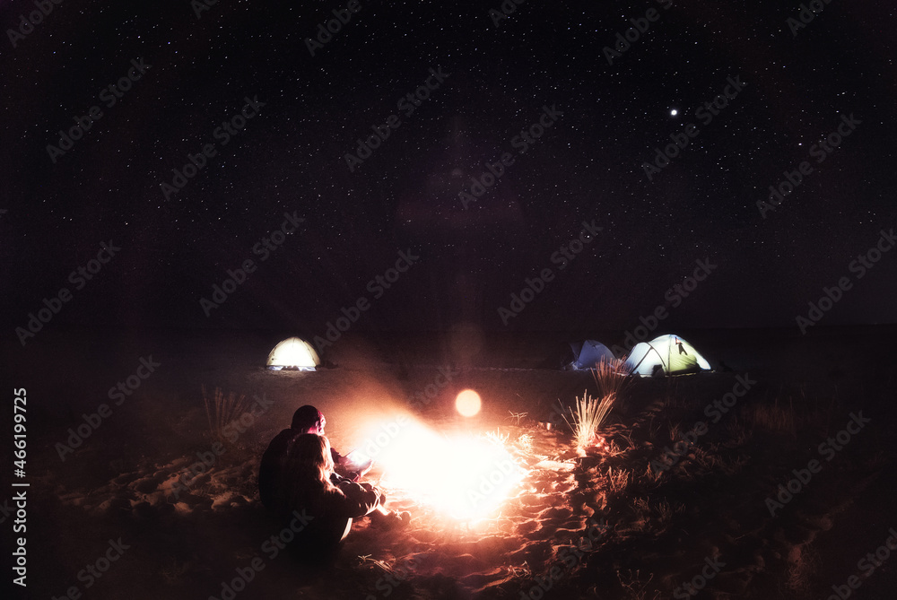People and fire at night on the beach, Ukraine People and fire at night on the beach, Ukraine