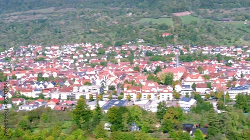 landscape top view, blurry panorama of the small European town of Dettingen, German village, houses, roads, trees, vineyards, vacation concept, travel, voyage, walk photo