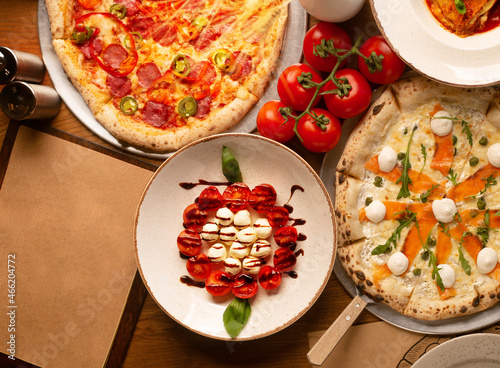 Top down view on enormous buffet of delicious freshly prepared european cuisine photo