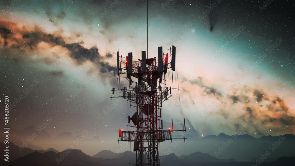 Camera spin around an antenna complex on a hill. Starry night in the mountains.