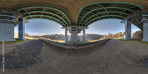 full hdri 360 panorama under steel frame construction of huge car bridge across river in seamless spherical equirectangular projection. VR AR content