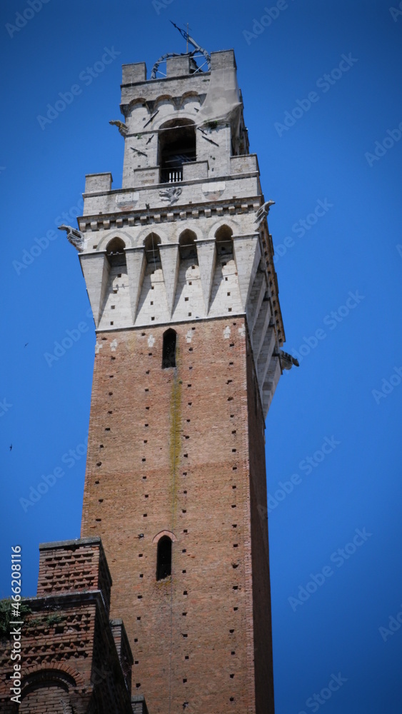 Bell tower of the Palazzo Pubblico, at the Piazzo del Campo, Siena, Italy.