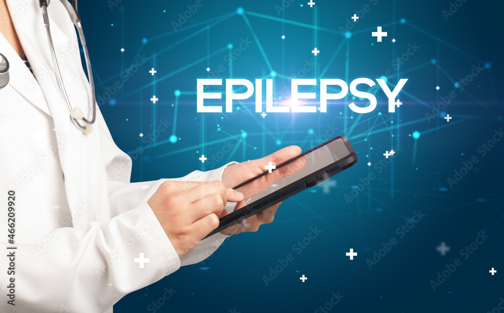 Doctor fills out medical record Doctor fills out medical record