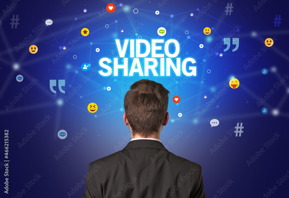 Rear view of a businessman, social media concept Rear view of a businessman, social media concept