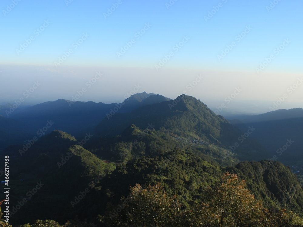 Obraz premium holiday with beautiful sky on the top summit Tugu Mountain in Pekalongan, Indonesia.