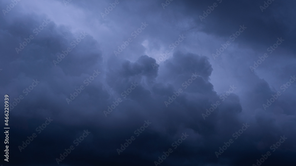 Dark storm clouds make the sky in black. Rain is coming soon. Nature background. Dark storm clouds make the sky in black. Rain is coming soon. Nature background.