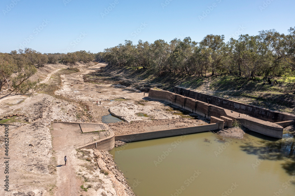 The Darling river at Bourke showing the weir and the river dry behind it. The Darling river at Bourke showing the weir and the river dry behind it.