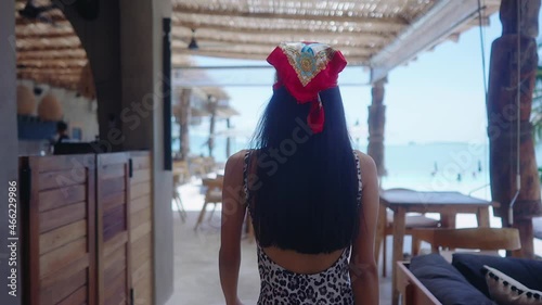 Back View Girl In Swimming Suit Walking Alone In Resort On Sunny Day Slow Motion