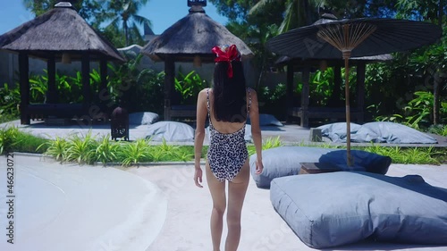 Back View Sexy Girl Swimming Suit Walking Alone In Resort Sunny Day SlowMotion