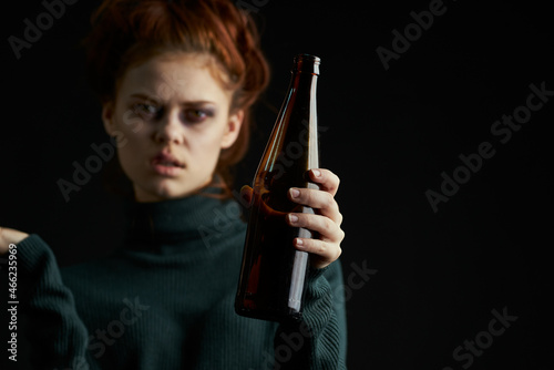 woman with cigarette bottle of alcohol bruises under eyes problems depression