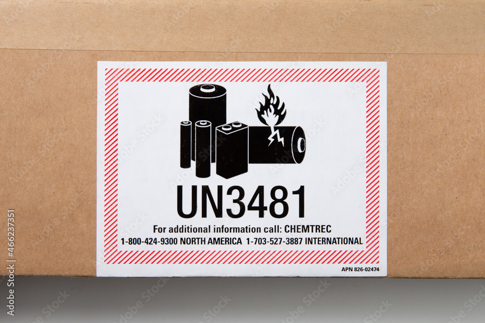 Close up of printed UN3481 sticker label about Lithium batteries are  dangerous goods on packaging Stock Photo | Adobe Stock
