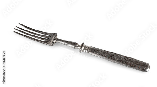 antique dirty silver fork isolated on white background