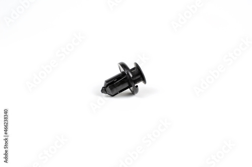 Plastic Black Clips For The Car. Close Up. Isolated On A White Background