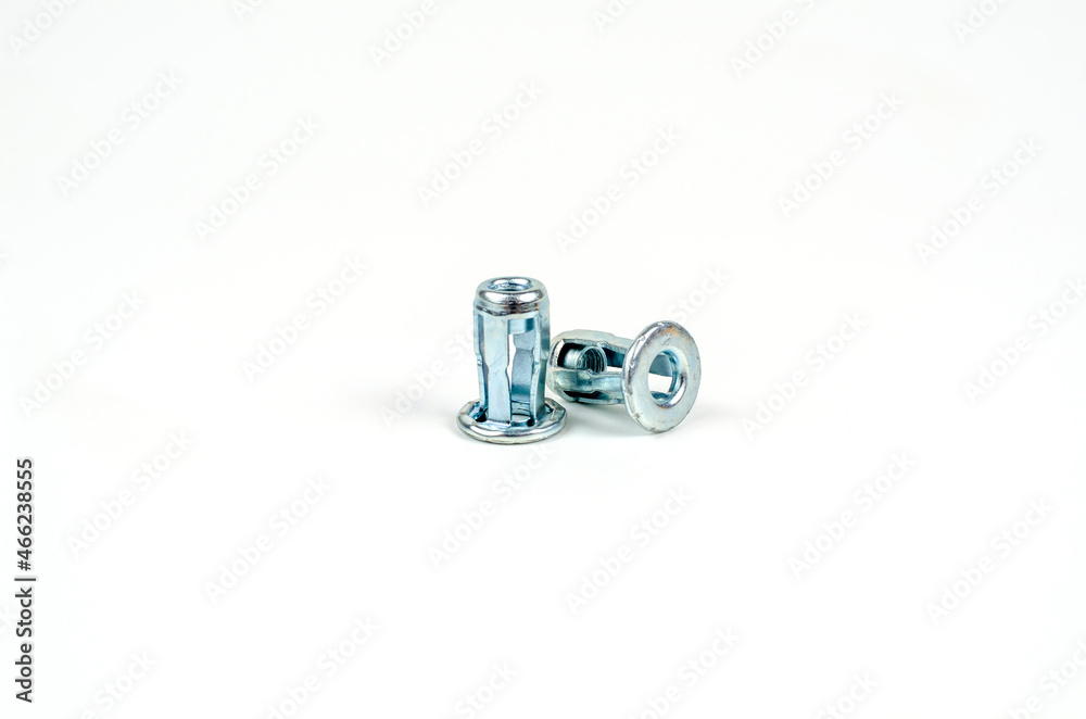 Metal brackets for self-tapping screws. Close up. Isolated on white background Metal brackets for self-tapping screws. Close up. Isolated on white background