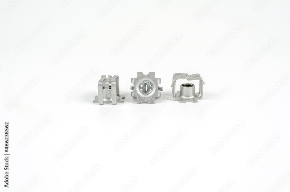 Metal brackets for self-tapping screws. Close up. Isolated on white background Metal brackets for self-tapping screws. Close up. Isolated on white background