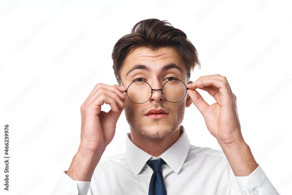 man with glasses gesturing with his hands light background man with glasses gesturing with his hands light background