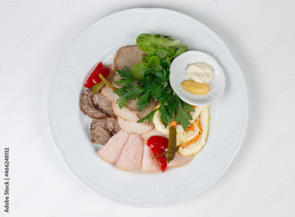 Top view of meat snacks on plate on white background Top view of meat snacks on plate on white background