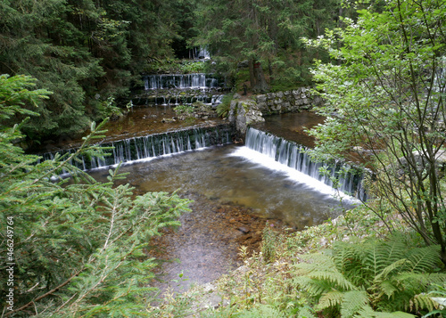 Confluence of rivers with cascades in the Giant Mountains in the Czech Republic