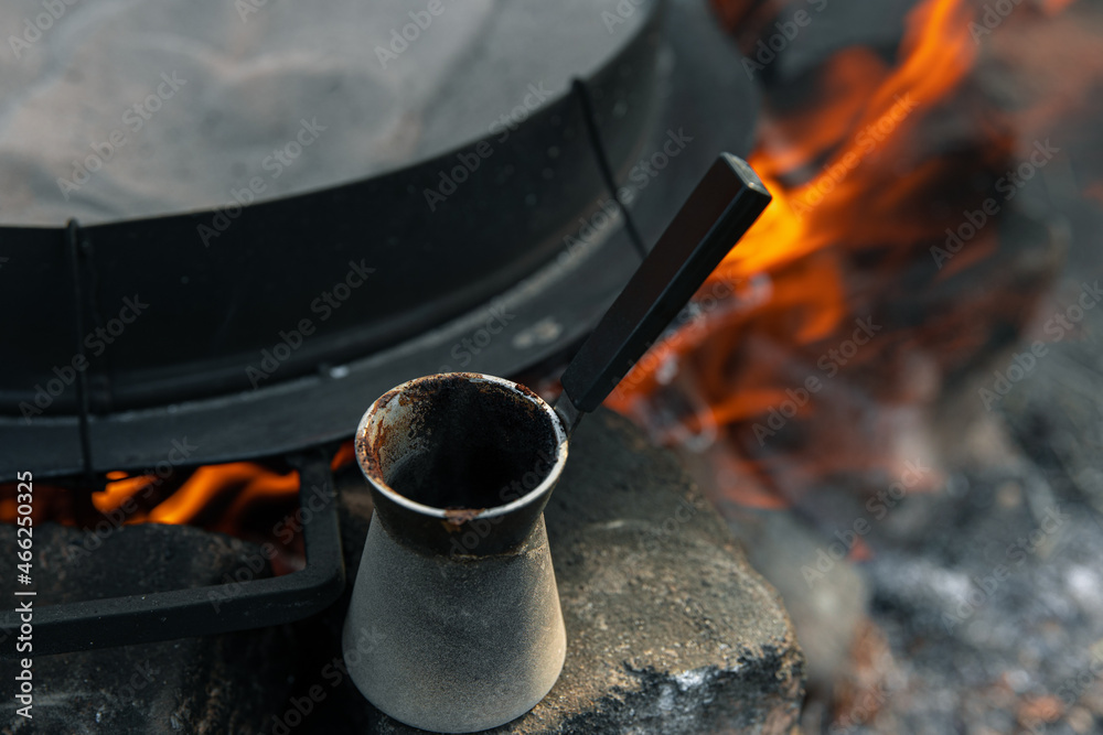 Close-up of a Turk with coffee on a blurred background. Close-up of a Turk with coffee on a blurred background.