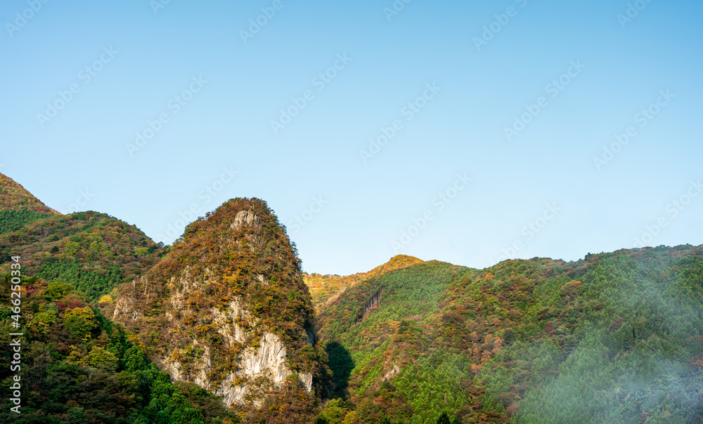 misty with morning mountain colourful autumn.landscape scene Okutama Japan.