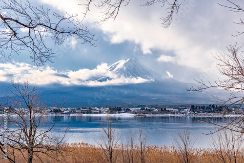 Fuji Mountain with Morning Mist in Winter Cloudy Day at Kawaguchiko Lake, Yamanashi, Japan