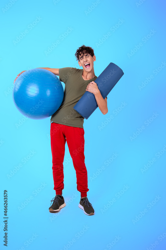 Young funny student is engaged in fitness. Young funny student is engaged in fitness.