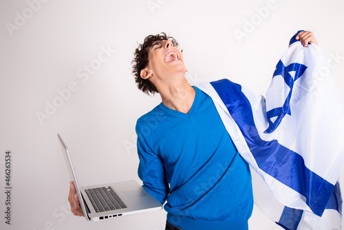 Young attractive guy with the Israeli flag. photo