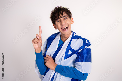 Young attractive guy with the Israeli flag. photo