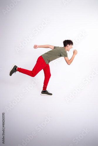 Young funny student is engaged in fitness.