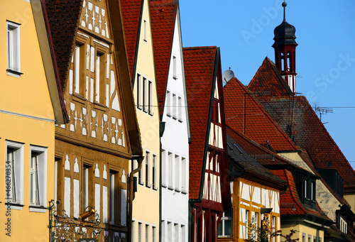 Hauptstrasse, facades of historic townhouses, in backgrrund tower of town hall, old town of Forchheim, Forchheim, Franconian Switzerland, Upper Franconia, Franconia, Bavaria, Germany, Europe photo