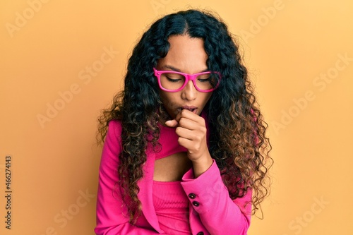 Young latin woman wearing business style and glasses feeling unwell and coughing as symptom for cold or bronchitis. health care concept.