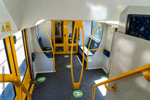 Photography Sydney train carriage with stickers sit here and stand here for social distancing during Covid-19 pandemic
